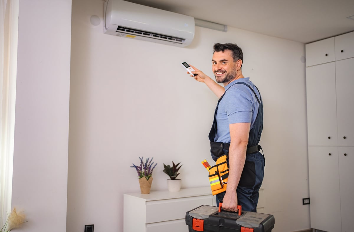 HVAC emergency repair technician installing air conditioner unit for same day HVAC repair in Coastal Georgia, Savannah, Pooler, and Richmond Hill GA